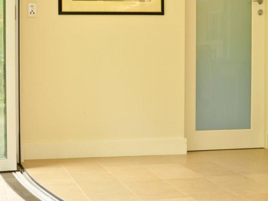 Threshold drainage system for bifold doors with Architectural (AR) grate style